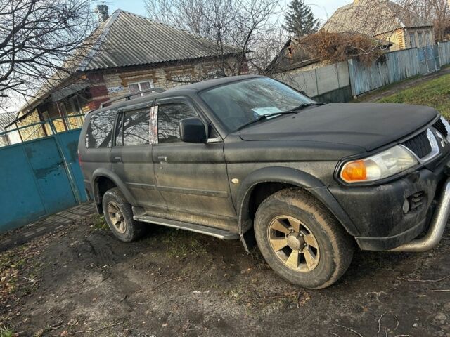 Черный Мицубиси Паджеро Спорт, объемом двигателя 3 л и пробегом 300 тыс. км за 5500 $, фото 4 на Automoto.ua