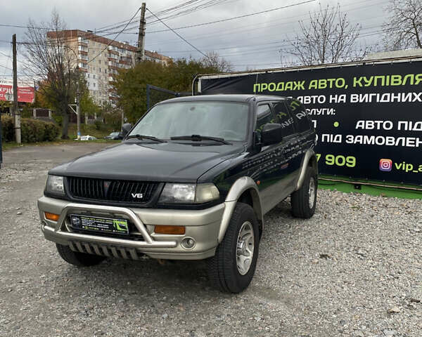 Черный Мицубиси Паджеро Спорт, объемом двигателя 3 л и пробегом 280 тыс. км за 6800 $, фото 1 на Automoto.ua