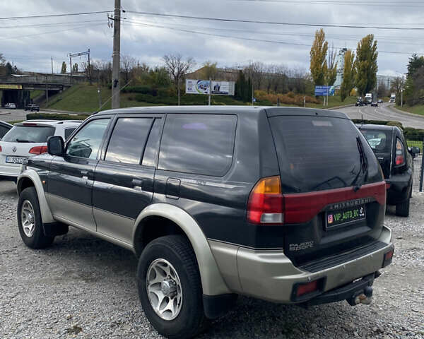 Черный Мицубиси Паджеро Спорт, объемом двигателя 3 л и пробегом 280 тыс. км за 6800 $, фото 4 на Automoto.ua