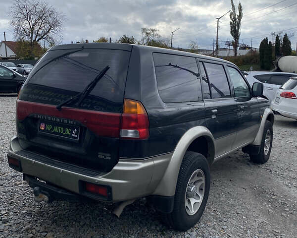 Черный Мицубиси Паджеро Спорт, объемом двигателя 3 л и пробегом 280 тыс. км за 6800 $, фото 3 на Automoto.ua