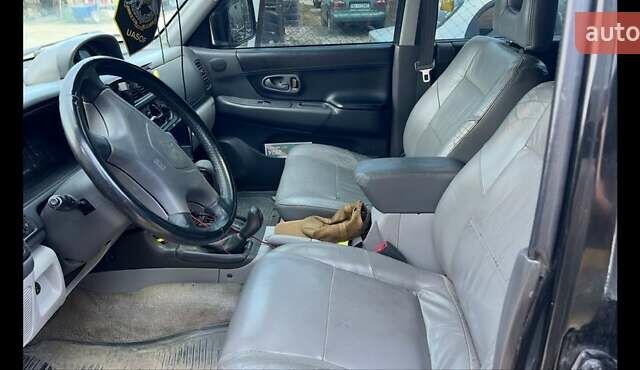 Черный Мицубиси Паджеро Спорт, объемом двигателя 3 л и пробегом 400 тыс. км за 6500 $, фото 17 на Automoto.ua