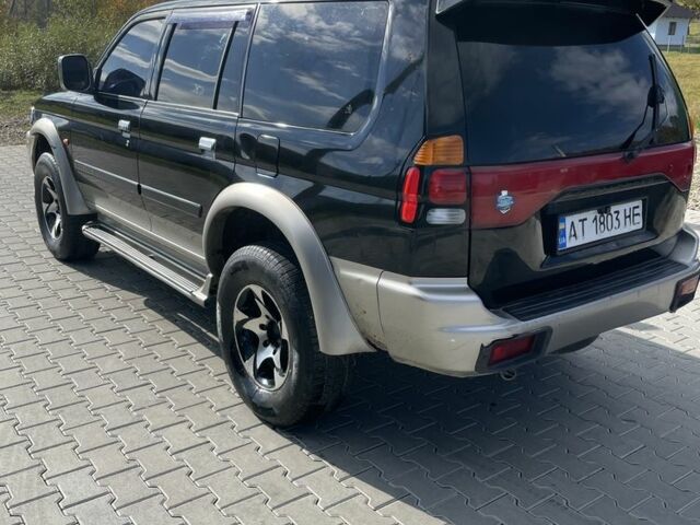 Черный Мицубиси Паджеро Спорт, объемом двигателя 3 л и пробегом 319 тыс. км за 5500 $, фото 4 на Automoto.ua