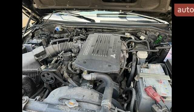 Черный Мицубиси Паджеро Спорт, объемом двигателя 3 л и пробегом 400 тыс. км за 6500 $, фото 10 на Automoto.ua