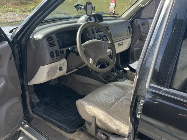 Черный Мицубиси Паджеро Спорт, объемом двигателя 3 л и пробегом 319 тыс. км за 5500 $, фото 7 на Automoto.ua