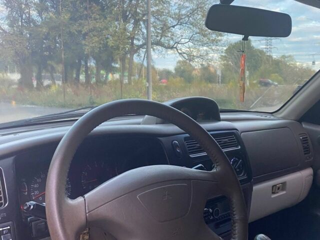 Чорний Міцубісі Паджеро Спорт, об'ємом двигуна 3 л та пробігом 280 тис. км за 4500 $, фото 10 на Automoto.ua