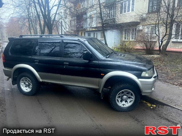 Чорний Міцубісі Паджеро Спорт, об'ємом двигуна 3 л та пробігом 185 тис. км за 6500 $, фото 1 на Automoto.ua