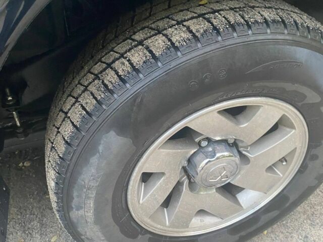 Чорний Міцубісі Паджеро Спорт, об'ємом двигуна 3 л та пробігом 280 тис. км за 4500 $, фото 12 на Automoto.ua