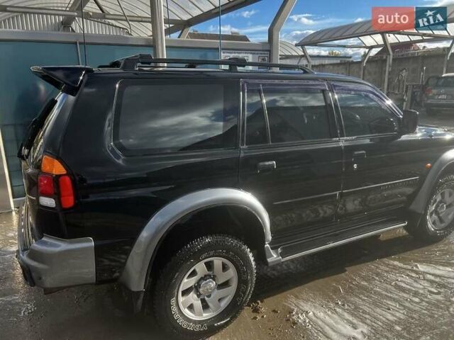 Черный Мицубиси Паджеро Спорт, объемом двигателя 3 л и пробегом 400 тыс. км за 6500 $, фото 3 на Automoto.ua