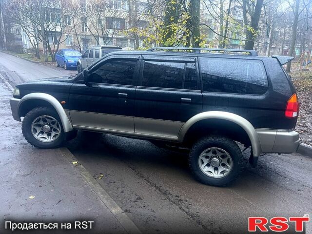 Чорний Міцубісі Паджеро Спорт, об'ємом двигуна 3 л та пробігом 185 тис. км за 6500 $, фото 2 на Automoto.ua