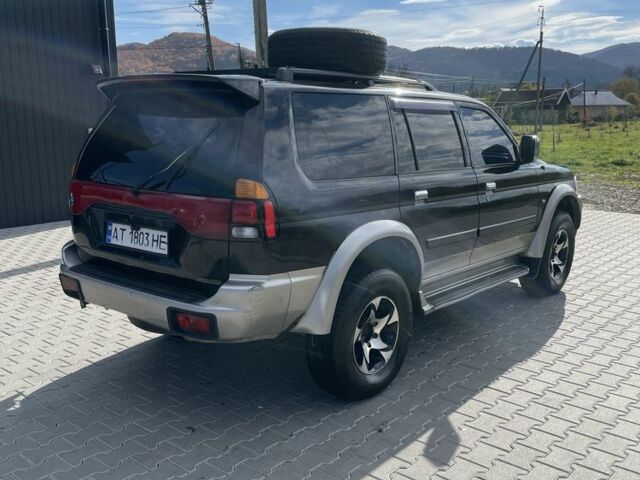 Черный Мицубиси Паджеро Спорт, объемом двигателя 3 л и пробегом 319 тыс. км за 5500 $, фото 1 на Automoto.ua