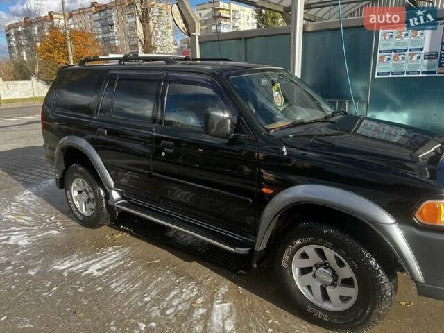 Черный Мицубиси Паджеро Спорт, объемом двигателя 3 л и пробегом 400 тыс. км за 6500 $, фото 4 на Automoto.ua