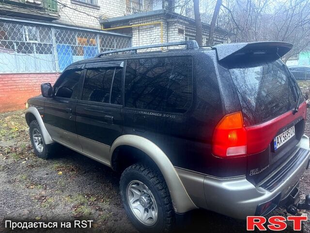 Чорний Міцубісі Паджеро Спорт, об'ємом двигуна 3 л та пробігом 185 тис. км за 6500 $, фото 8 на Automoto.ua