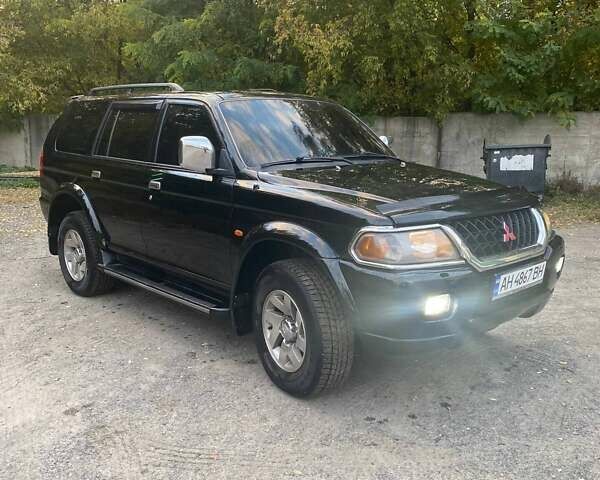 Чорний Міцубісі Паджеро Спорт, об'ємом двигуна 3 л та пробігом 280 тис. км за 4500 $, фото 2 на Automoto.ua