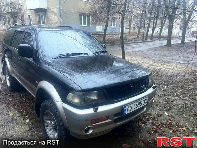 Чорний Міцубісі Паджеро Спорт, об'ємом двигуна 3 л та пробігом 185 тис. км за 6500 $, фото 11 на Automoto.ua