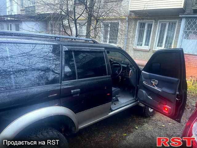 Чорний Міцубісі Паджеро Спорт, об'ємом двигуна 3 л та пробігом 185 тис. км за 6500 $, фото 5 на Automoto.ua