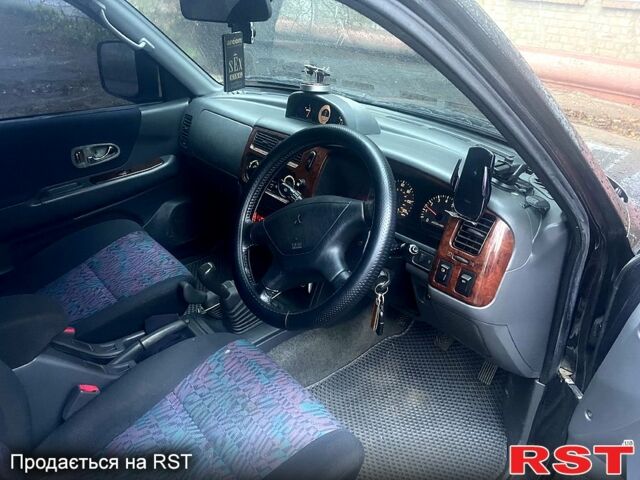 Чорний Міцубісі Паджеро Спорт, об'ємом двигуна 3 л та пробігом 185 тис. км за 6500 $, фото 9 на Automoto.ua