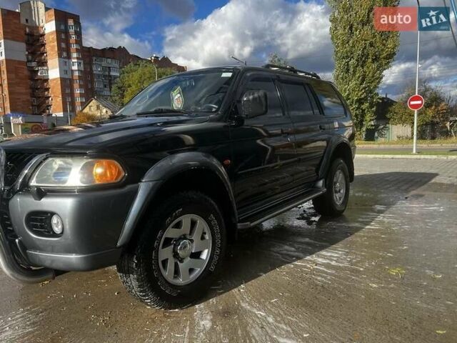 Черный Мицубиси Паджеро Спорт, объемом двигателя 3 л и пробегом 400 тыс. км за 6500 $, фото 1 на Automoto.ua