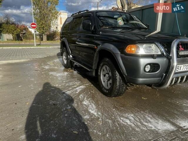 Черный Мицубиси Паджеро Спорт, объемом двигателя 3 л и пробегом 400 тыс. км за 6500 $, фото 5 на Automoto.ua