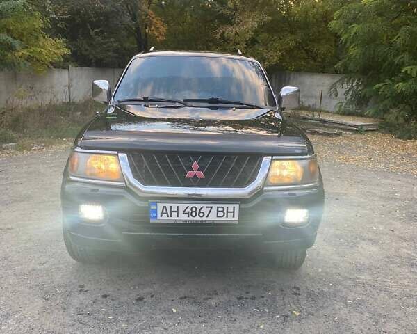 Чорний Міцубісі Паджеро Спорт, об'ємом двигуна 3 л та пробігом 280 тис. км за 4500 $, фото 1 на Automoto.ua