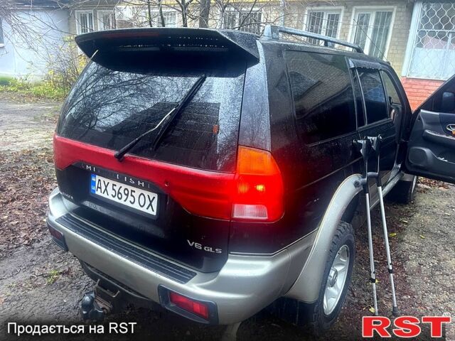 Чорний Міцубісі Паджеро Спорт, об'ємом двигуна 3 л та пробігом 185 тис. км за 6500 $, фото 3 на Automoto.ua