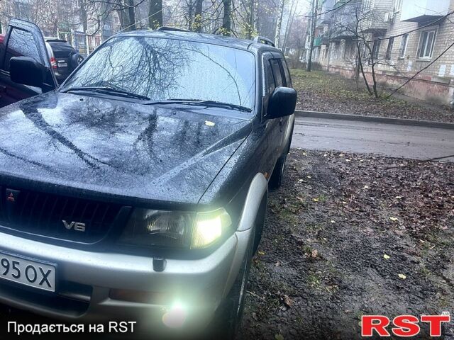 Чорний Міцубісі Паджеро Спорт, об'ємом двигуна 3 л та пробігом 185 тис. км за 6500 $, фото 6 на Automoto.ua