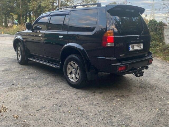 Чорний Міцубісі Паджеро Спорт, об'ємом двигуна 3 л та пробігом 280 тис. км за 4500 $, фото 6 на Automoto.ua