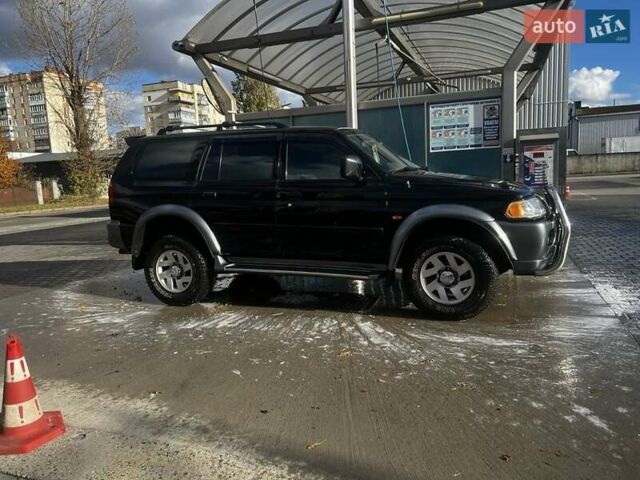 Черный Мицубиси Паджеро Спорт, объемом двигателя 3 л и пробегом 400 тыс. км за 6500 $, фото 2 на Automoto.ua