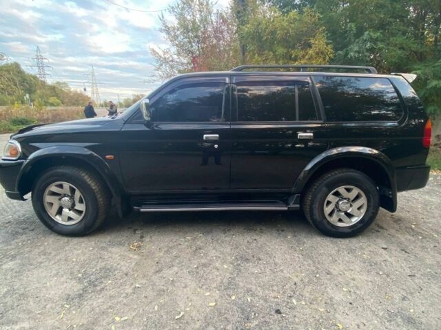 Чорний Міцубісі Паджеро Спорт, об'ємом двигуна 3 л та пробігом 280 тис. км за 4500 $, фото 7 на Automoto.ua