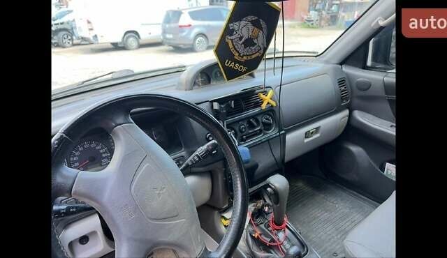 Черный Мицубиси Паджеро Спорт, объемом двигателя 3 л и пробегом 400 тыс. км за 6500 $, фото 16 на Automoto.ua