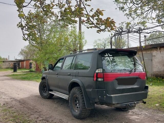 Чорний Міцубісі Паджеро Спорт, об'ємом двигуна 0.25 л та пробігом 200 тис. км за 5000 $, фото 2 на Automoto.ua