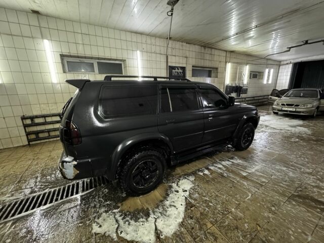 Черный Мицубиси Паджеро Спорт, объемом двигателя 3 л и пробегом 420 тыс. км за 4500 $, фото 1 на Automoto.ua