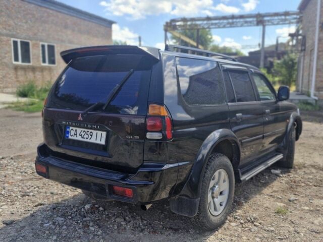Чорний Міцубісі Паджеро Спорт, об'ємом двигуна 3 л та пробігом 278 тис. км за 6200 $, фото 2 на Automoto.ua