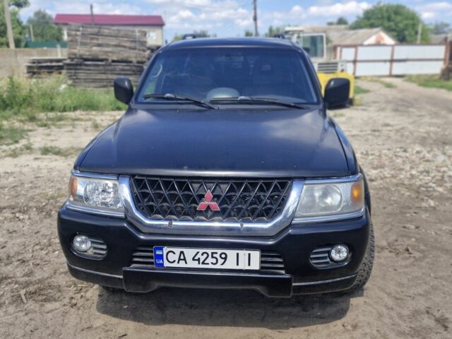 Чорний Міцубісі Паджеро Спорт, об'ємом двигуна 3 л та пробігом 278 тис. км за 6200 $, фото 1 на Automoto.ua