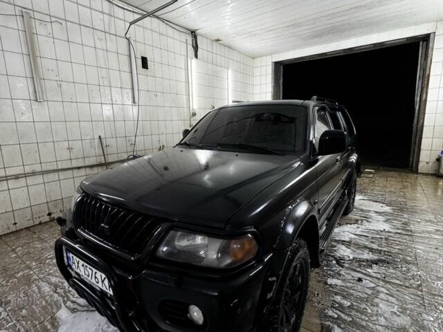 Черный Мицубиси Паджеро Спорт, объемом двигателя 3 л и пробегом 420 тыс. км за 4500 $, фото 3 на Automoto.ua