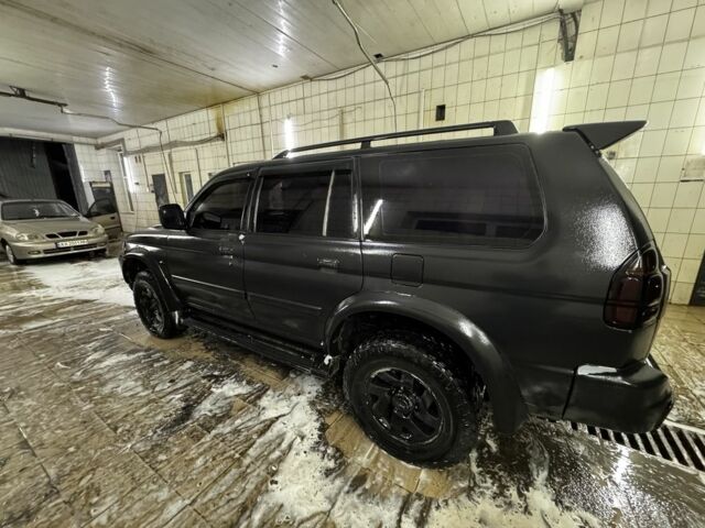 Черный Мицубиси Паджеро Спорт, объемом двигателя 3 л и пробегом 420 тыс. км за 4500 $, фото 5 на Automoto.ua
