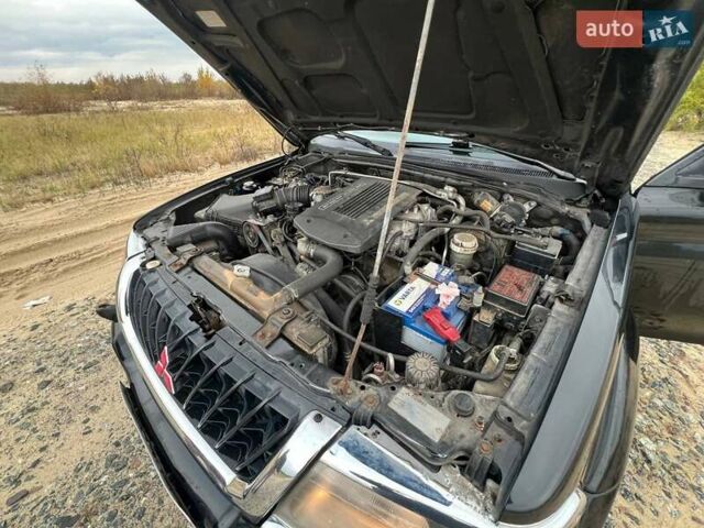Мицубиси Паджеро Спорт 2002 в Украинке на Automoto.ua Черный Мицубиси Паджеро Спорт, объемом двигателя 2.97 л и пробегом 270 тыс. км за 7000 $, фото 24 на Automoto.ua