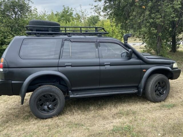 Мицубиси Паджеро Спорт 2002 в Тальном на Automoto.ua Черный Мицубиси Паджеро Спорт, объемом двигателя 2.5 л и пробегом 200 тыс. км за 3600 $, фото 5 на Automoto.ua
