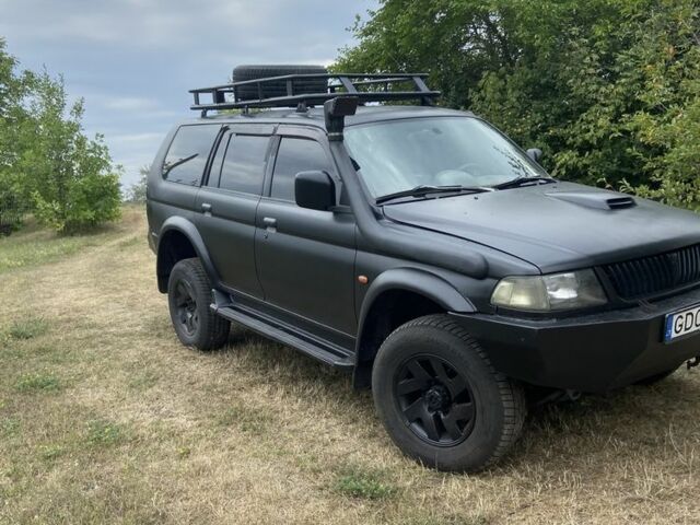 Мицубиси Паджеро Спорт 2002 в Тальном на Automoto.ua Черный Мицубиси Паджеро Спорт, объемом двигателя 2.5 л и пробегом 200 тыс. км за 3600 $, фото 6 на Automoto.ua