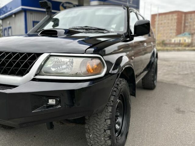 Мицубиси Паджеро Спорт 2002 в Славянске на Automoto.ua Черный Мицубиси Паджеро Спорт, объемом двигателя 2.5 л и пробегом 333 тыс. км за 3450 $, фото 9 на Automoto.ua