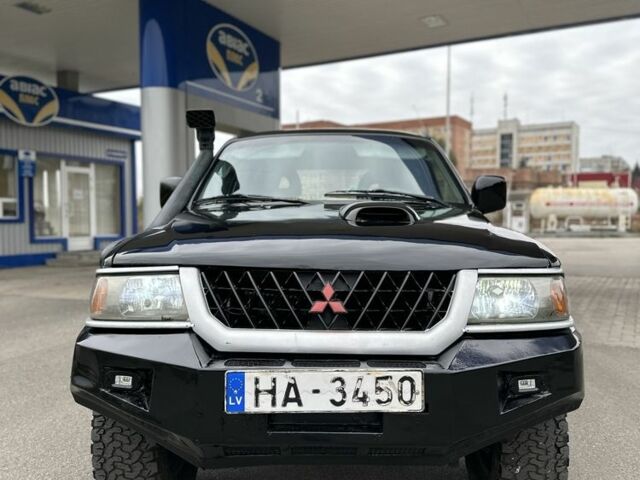 Мицубиси Паджеро Спорт 2002 в Славянске на Automoto.ua Черный Мицубиси Паджеро Спорт, объемом двигателя 2.5 л и пробегом 333 тыс. км за 3450 $, фото 2 на Automoto.ua
