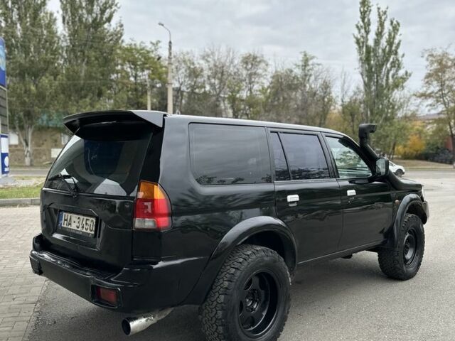 Мицубиси Паджеро Спорт 2002 в Славянске на Automoto.ua Черный Мицубиси Паджеро Спорт, объемом двигателя 2.5 л и пробегом 333 тыс. км за 3450 $, фото 4 на Automoto.ua