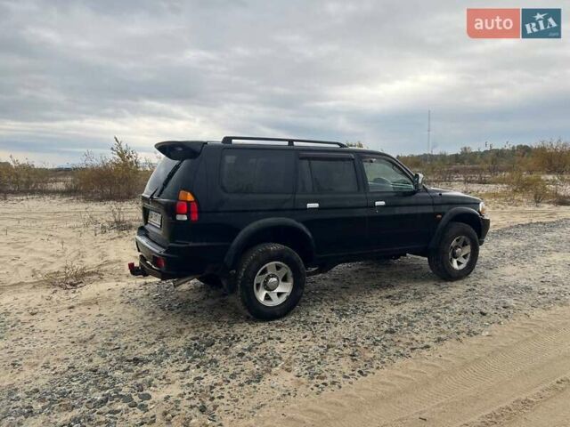 Мицубиси Паджеро Спорт 2002 в Украинке на Automoto.ua Черный Мицубиси Паджеро Спорт, объемом двигателя 2.97 л и пробегом 270 тыс. км за 7000 $, фото 7 на Automoto.ua