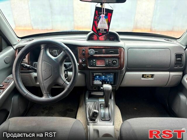 Чорний Міцубісі Паджеро Спорт, об'ємом двигуна 3 л та пробігом 270 тис. км за 6200 $, фото 6 на Automoto.ua