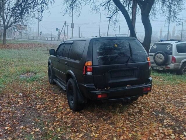 Чорний Міцубісі Паджеро Спорт, об'ємом двигуна 0 л та пробігом 400 тис. км за 4057 $, фото 4 на Automoto.ua