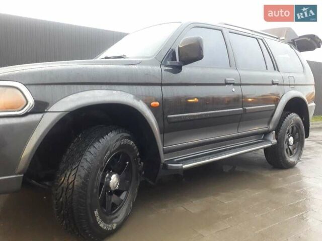 Черный Мицубиси Паджеро Спорт, объемом двигателя 2.97 л и пробегом 290 тыс. км за 9500 $, фото 2 на Automoto.ua