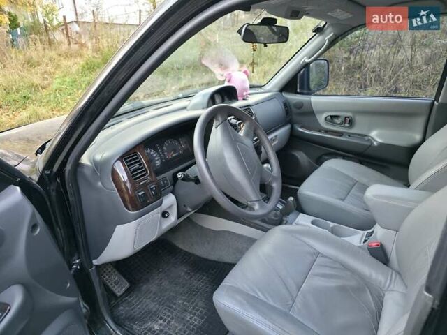 Чорний Міцубісі Паджеро Спорт, об'ємом двигуна 2.97 л та пробігом 126 тис. км за 10500 $, фото 8 на Automoto.ua