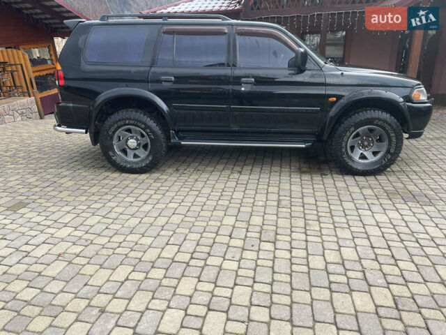 Черный Мицубиси Паджеро Спорт, объемом двигателя 3 л и пробегом 305 тыс. км за 7200 $, фото 7 на Automoto.ua