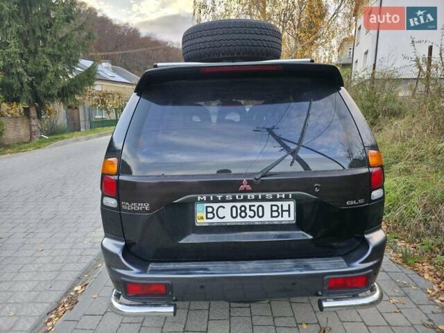 Чорний Міцубісі Паджеро Спорт, об'ємом двигуна 2.97 л та пробігом 126 тис. км за 10500 $, фото 7 на Automoto.ua