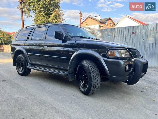 Черный Мицубиси Паджеро Спорт, объемом двигателя 3 л и пробегом 430 тыс. км за 9777 $, фото 2 на Automoto.ua