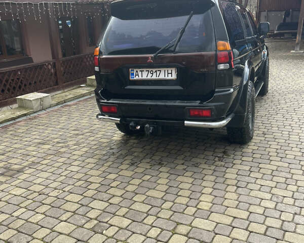 Черный Мицубиси Паджеро Спорт, объемом двигателя 3 л и пробегом 305 тыс. км за 7200 $, фото 4 на Automoto.ua